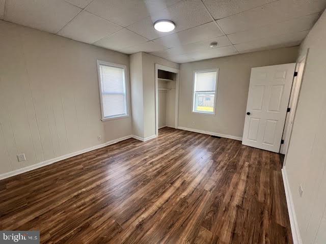 107 Church Street, Unit B Glassboro, NJ 08028 - Photo 8 of 9 a view of an empty room with wooden floor and a window