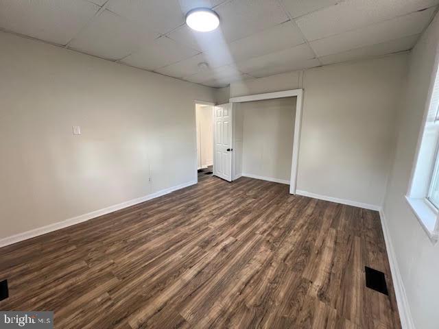 107 Church Street, Unit B Glassboro, NJ 08028 - Photo 9 of 9 an empty room with wooden floor and windows