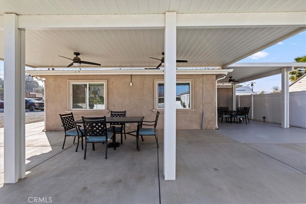 19594 Temescal Canyon Road Corona, CA 92881 - Photo 14 of 50 a view of a livingroom with furniture and a window