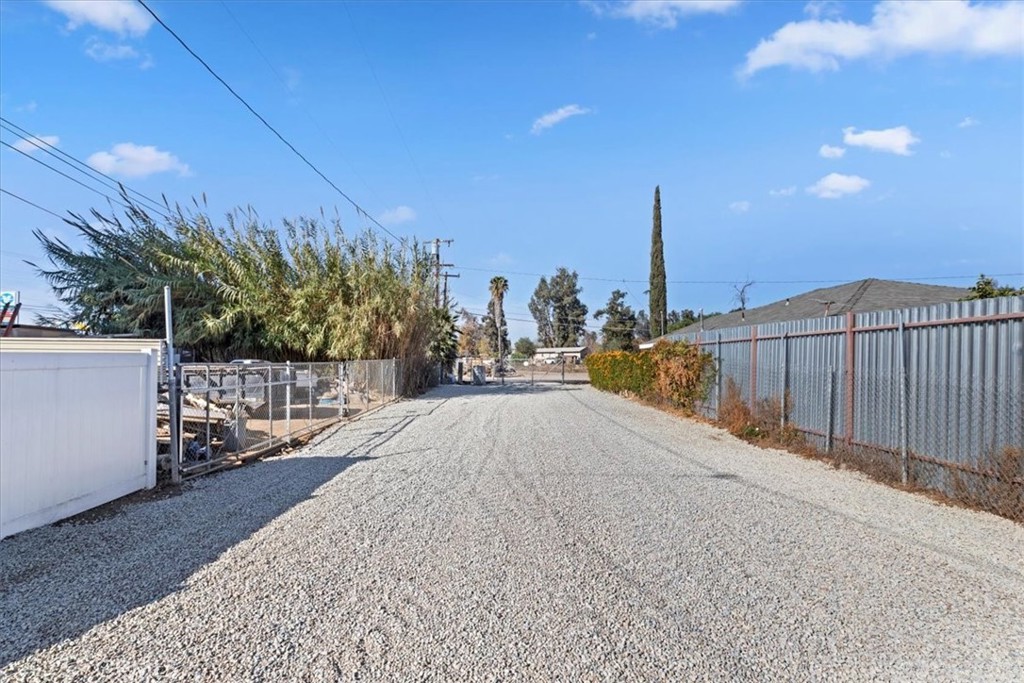 19594 Temescal Canyon Road Corona, CA 92881 - Photo 24 of 50 a view of a terrace with a bench