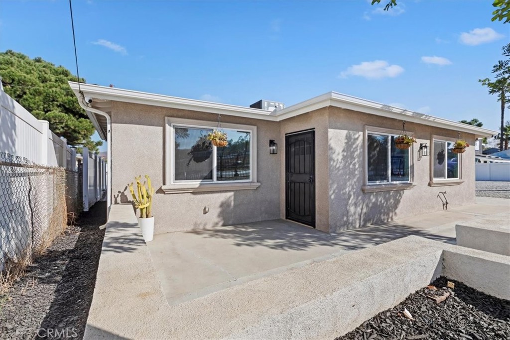 19594 Temescal Canyon Road Corona, CA 92881 - Photo 7 of 50 a view of a house with backyard and sitting area
