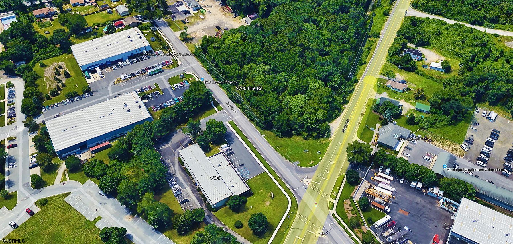 2700 Fire Road Egg Harbor Township, NJ 08234 - Photo 1 of 3 an aerial view of a residential houses with yard