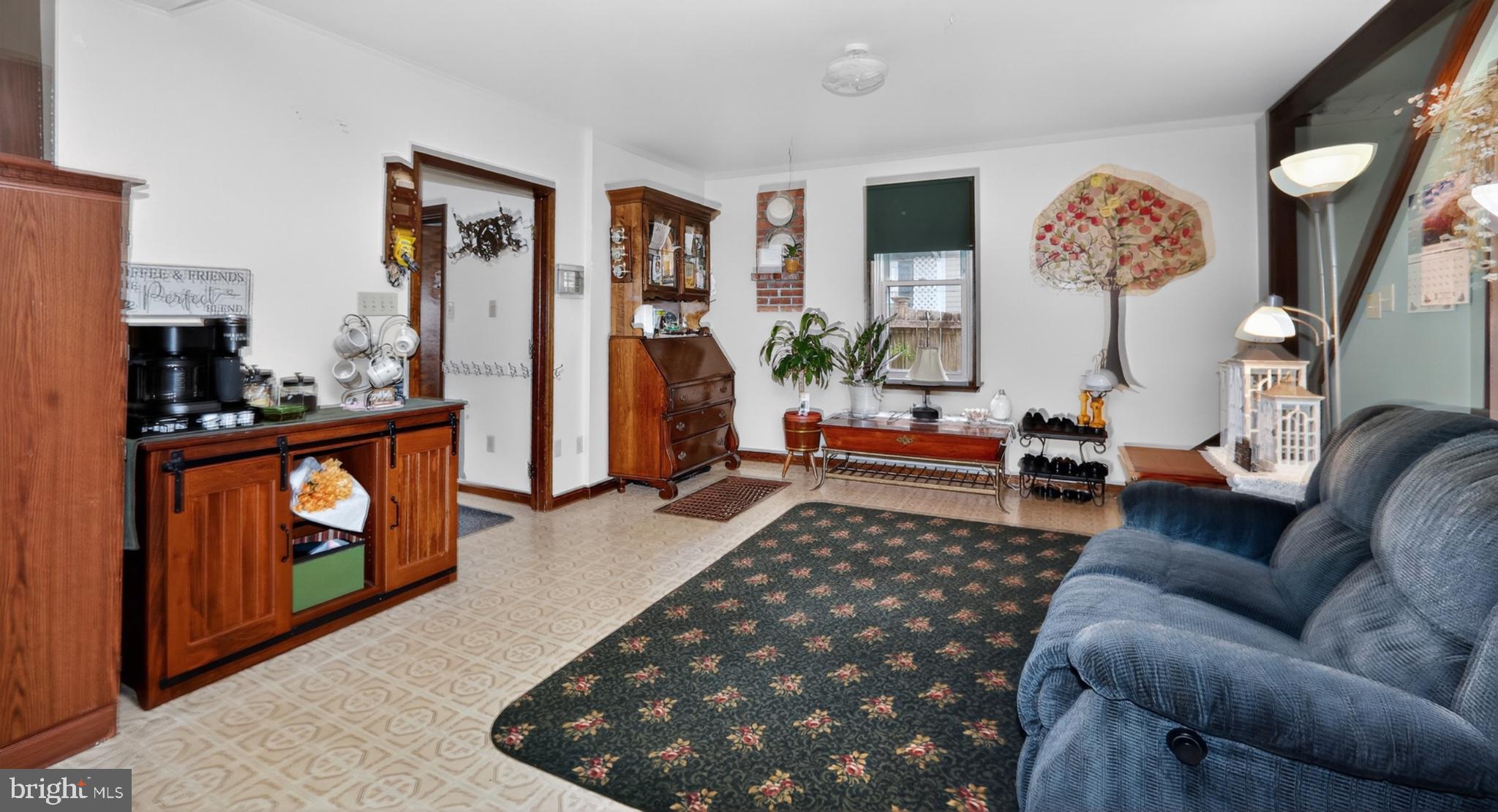 40 Queen Road Intercourse, PA 17529 - Photo 50 of 58 a living room with furniture and a fireplace