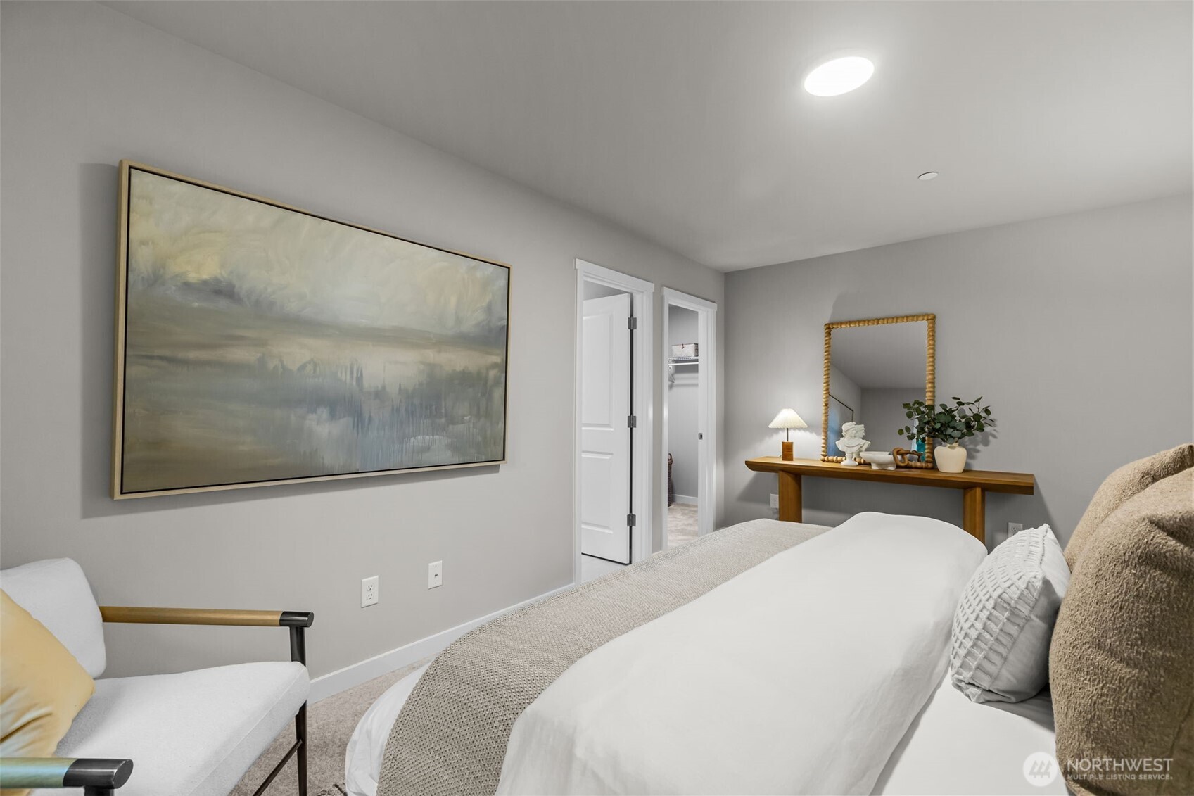 110 169th Place Southwest, Unit A Bothell, WA 98012 - Photo 13 of 29 a bedroom with a bed and a flat screen tv
