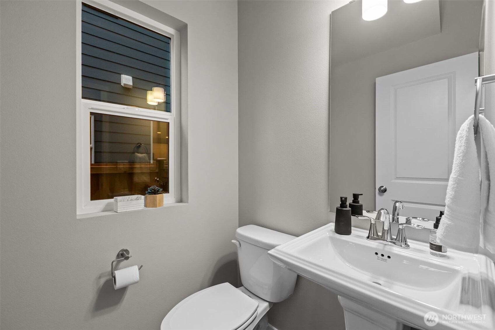 110 169th Place Southwest, Unit A Bothell, WA 98012 - Photo 16 of 29 a bathroom with a toilet a sink and mirror