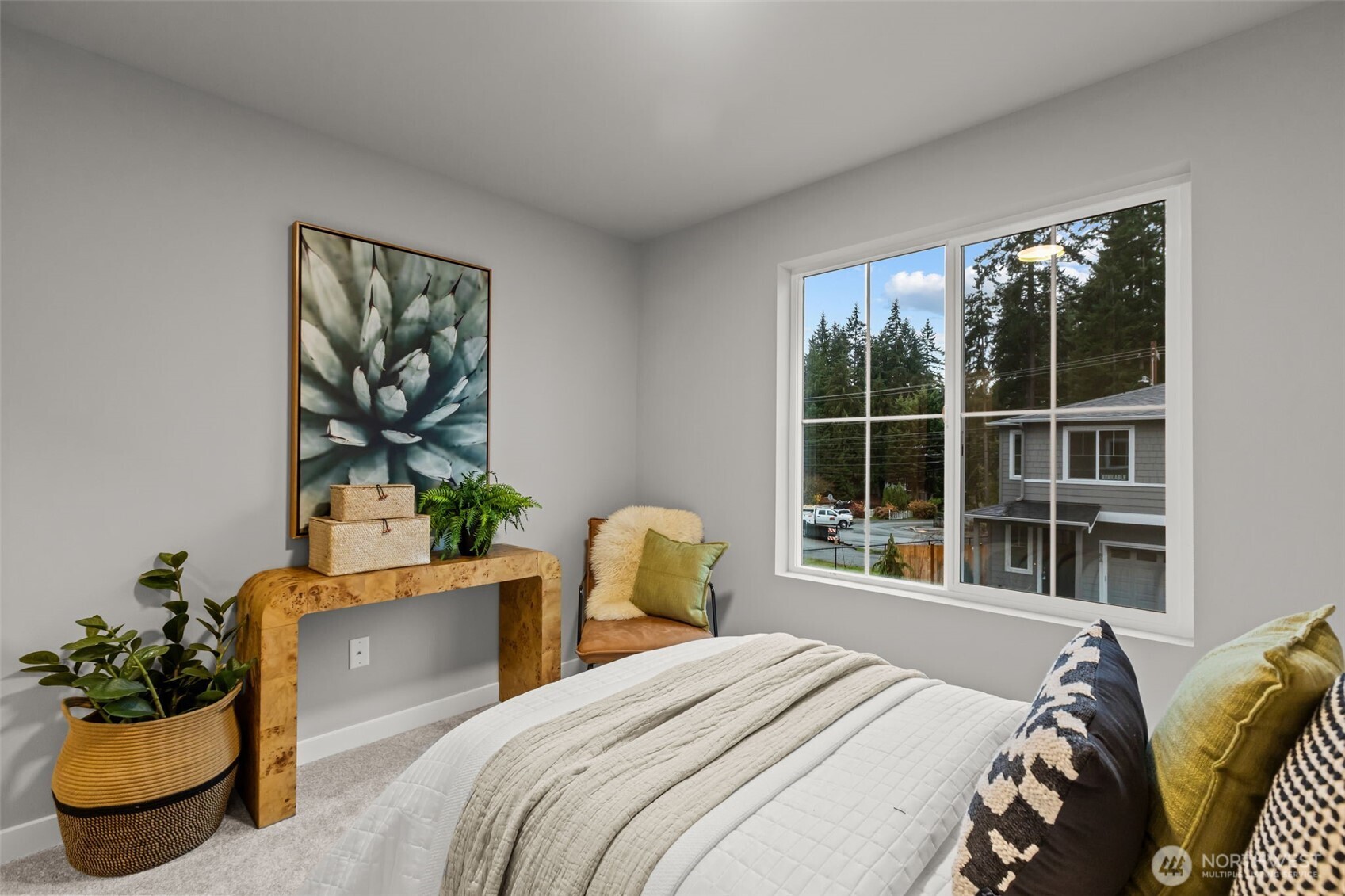 110 169th Place Southwest, Unit A Bothell, WA 98012 - Photo 22 of 29 a bedroom with a bed and a window