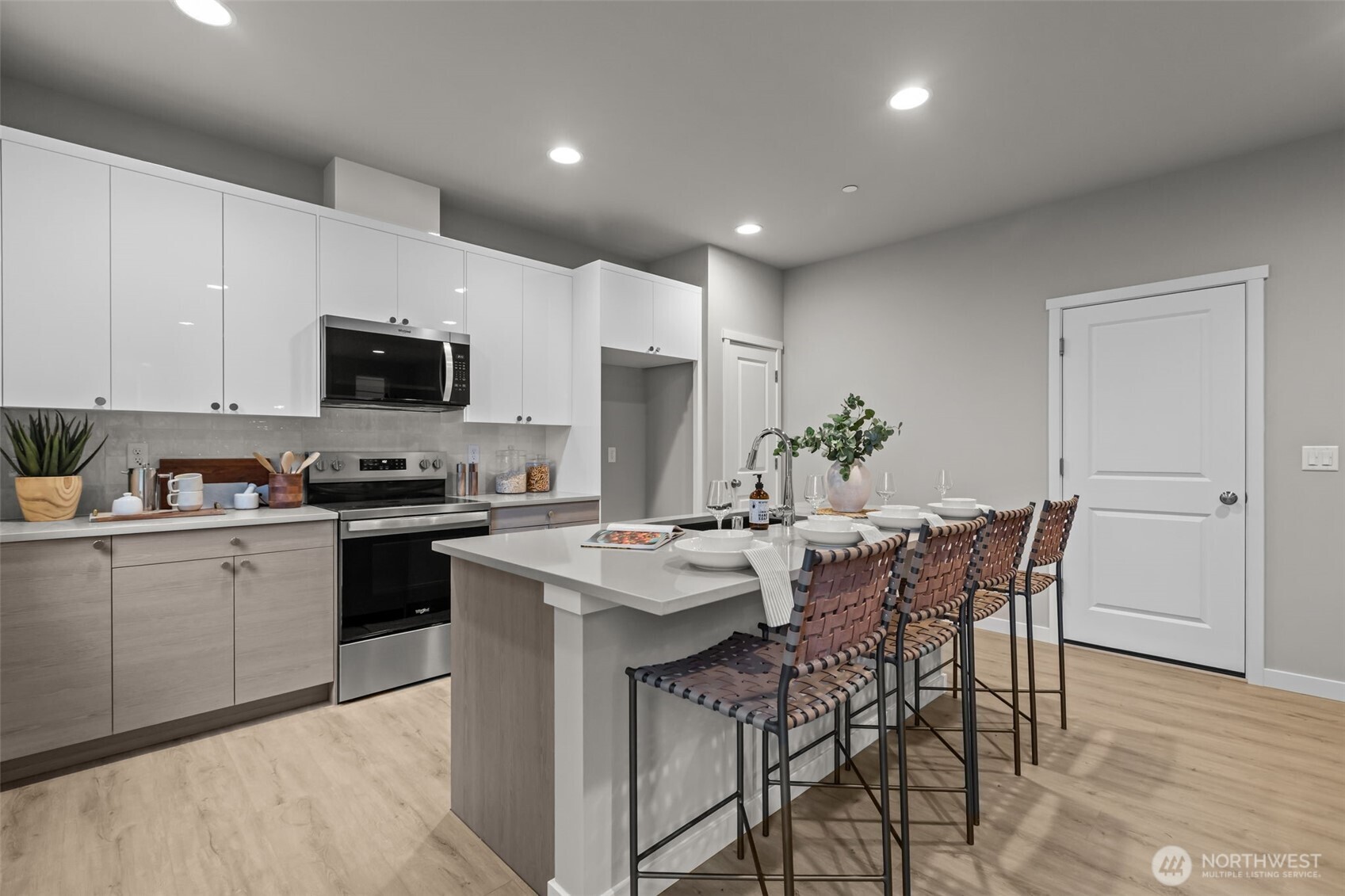 110 169th Place Southwest, Unit A Bothell, WA 98012 - Photo 9 of 29 a kitchen that has a table and chairs in it