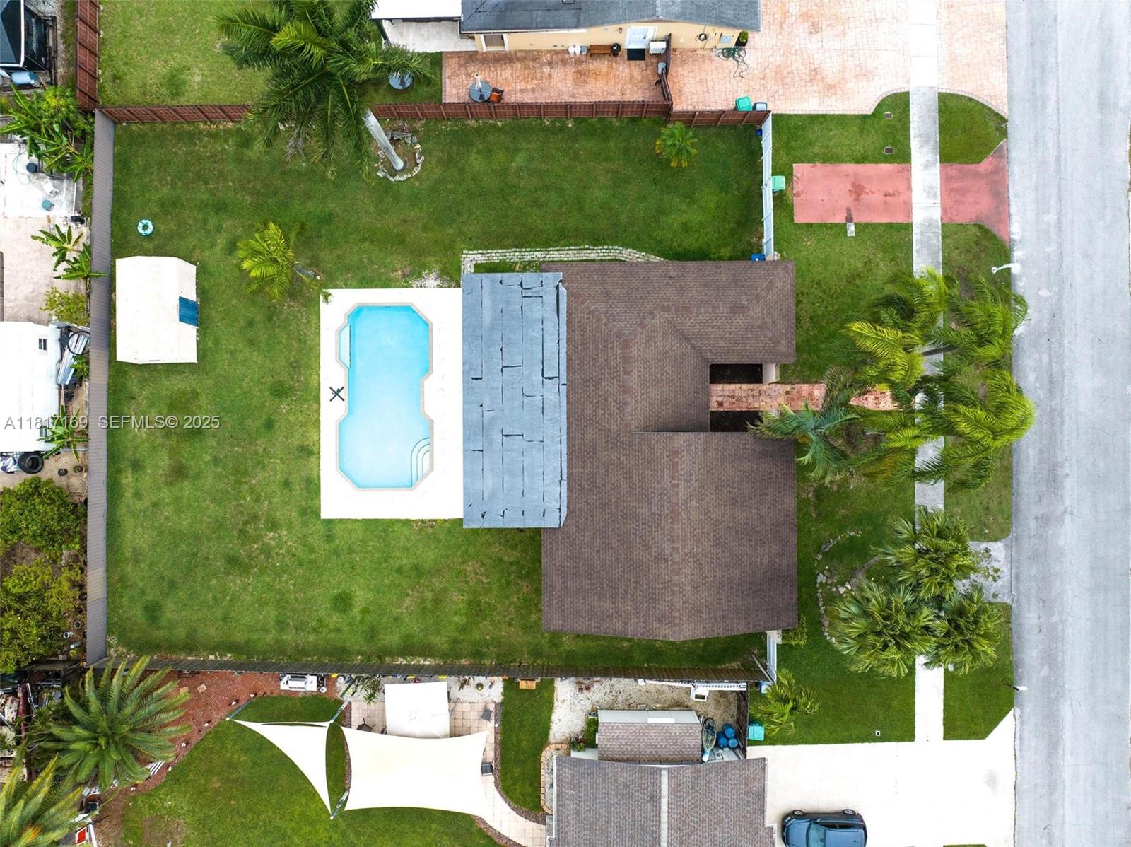 30930 Southwest 190th Avenue Homestead, FL 33030 - Photo 1 of 36 an aerial view of a house with a yard