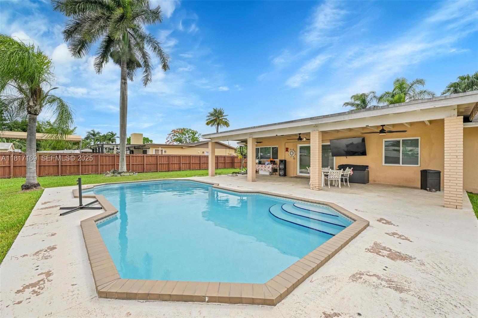 30930 Southwest 190th Avenue Homestead, FL 33030 - Photo 29 of 36 swimming pool view with a outdoor space
