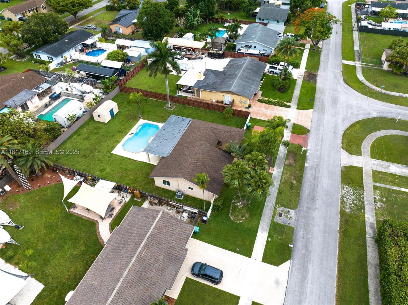30930 Southwest 190th Avenue Homestead, FL 33030 - Photo 36 of 36 an aerial view of a house with a garden