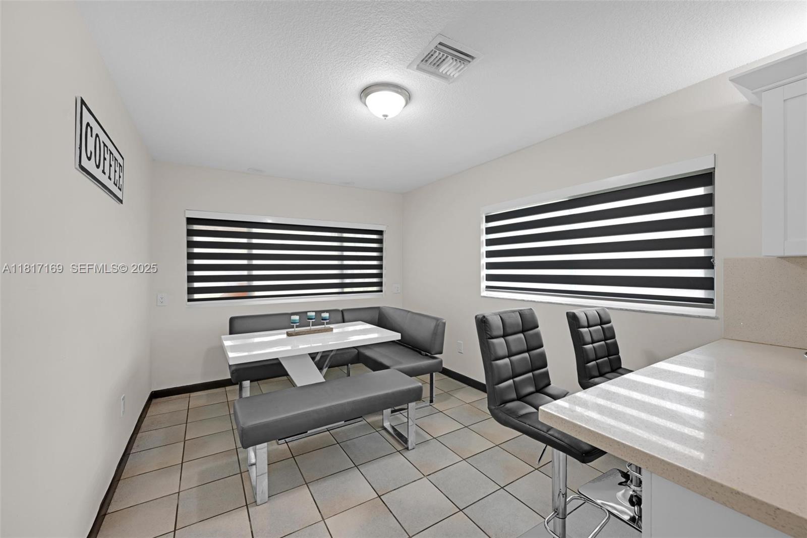 30930 Southwest 190th Avenue Homestead, FL 33030 - Photo 10 of 36 a bedroom with furniture and window