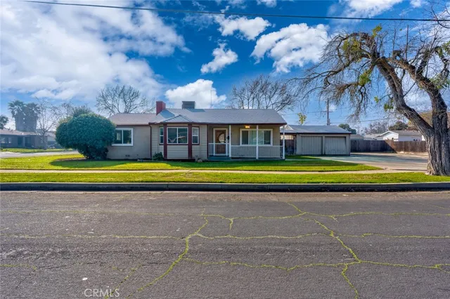 a view of swimming pool with trees in front of it