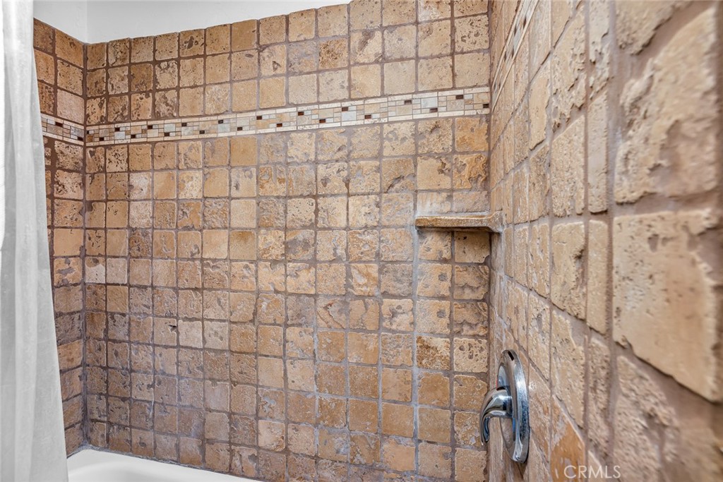 598 East 19th Street Merced, CA 95340 - Photo 13 of 25 a bathroom with a shower