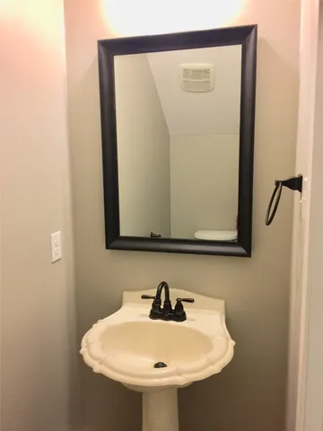 a kitchen that has a sink and a stove