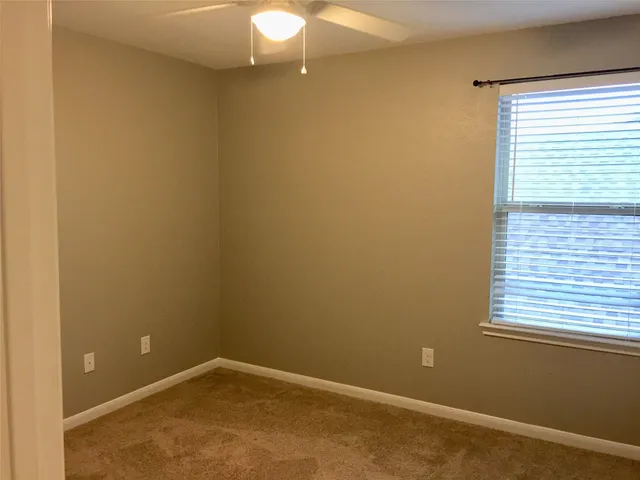 a view of a small space with a window