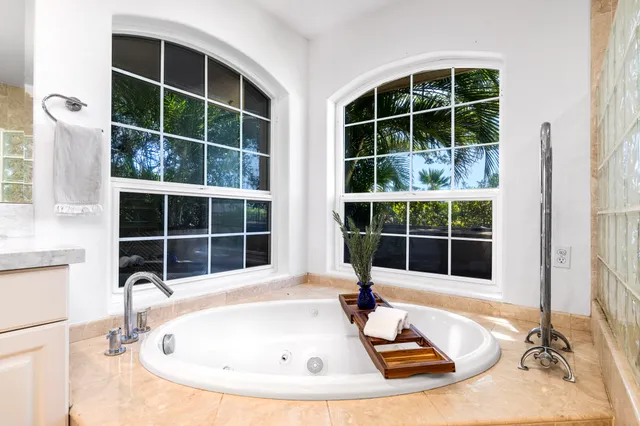 a view of a bathroom with tub