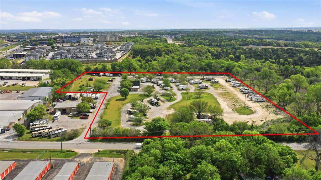 2205 Tin Top Road Weatherford, TX 76087 - Photo 2 of 21 an aerial view of residential houses with outdoor space and trees