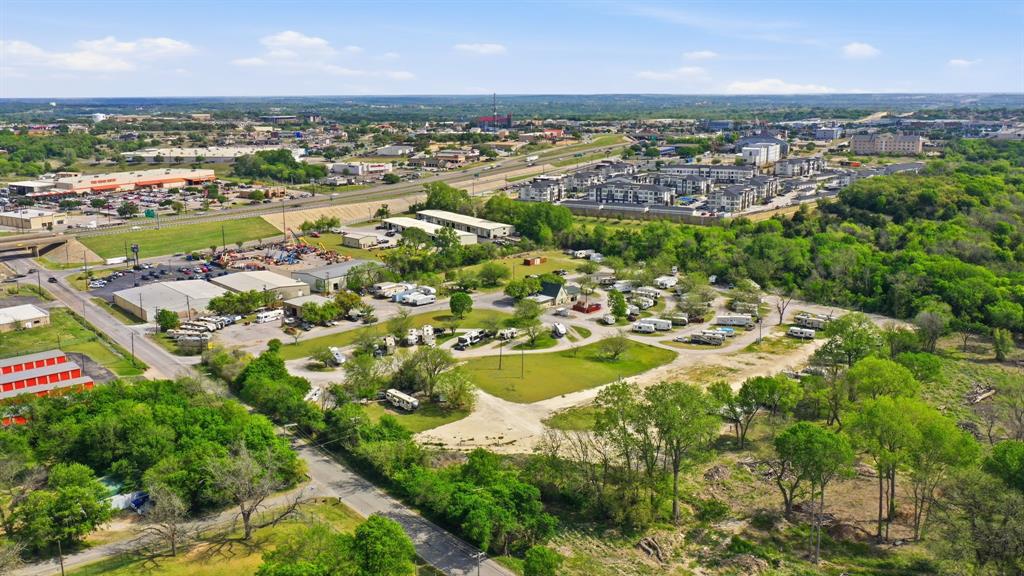 2205 Tin Top Road Weatherford, TX 76087 - Photo 6 of 21 an aerial view of residential houses with outdoor space and trees