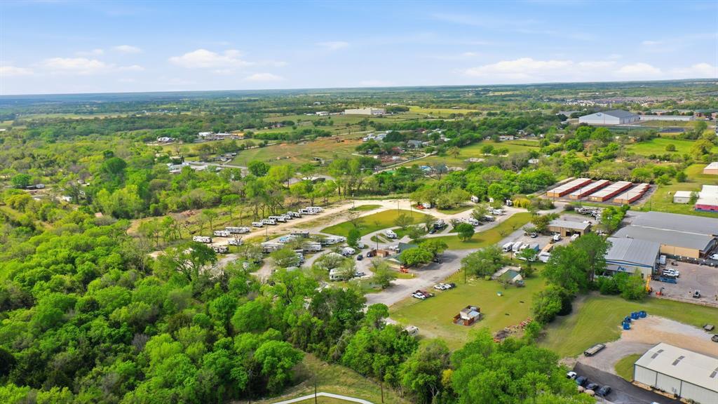 2205 Tin Top Road Weatherford, TX 76087 - Photo 10 of 21 an aerial view of residential houses with outdoor space and trees