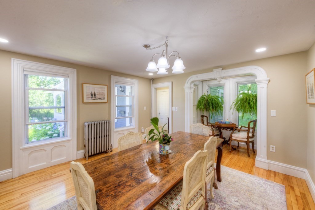 167 Worcester Street Grafton, MA 01536 - Photo 17 of 42 a view of a dining room with furniture window and wooden floor