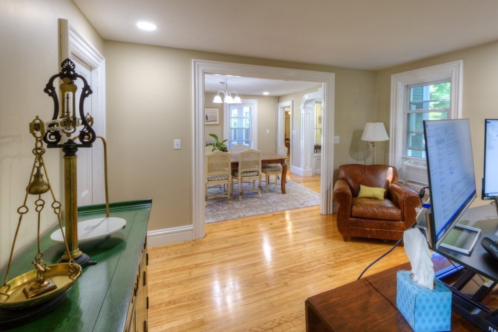 167 Worcester Street Grafton, MA 01536 - Photo 24 of 42 a living room with furniture and a mirror
