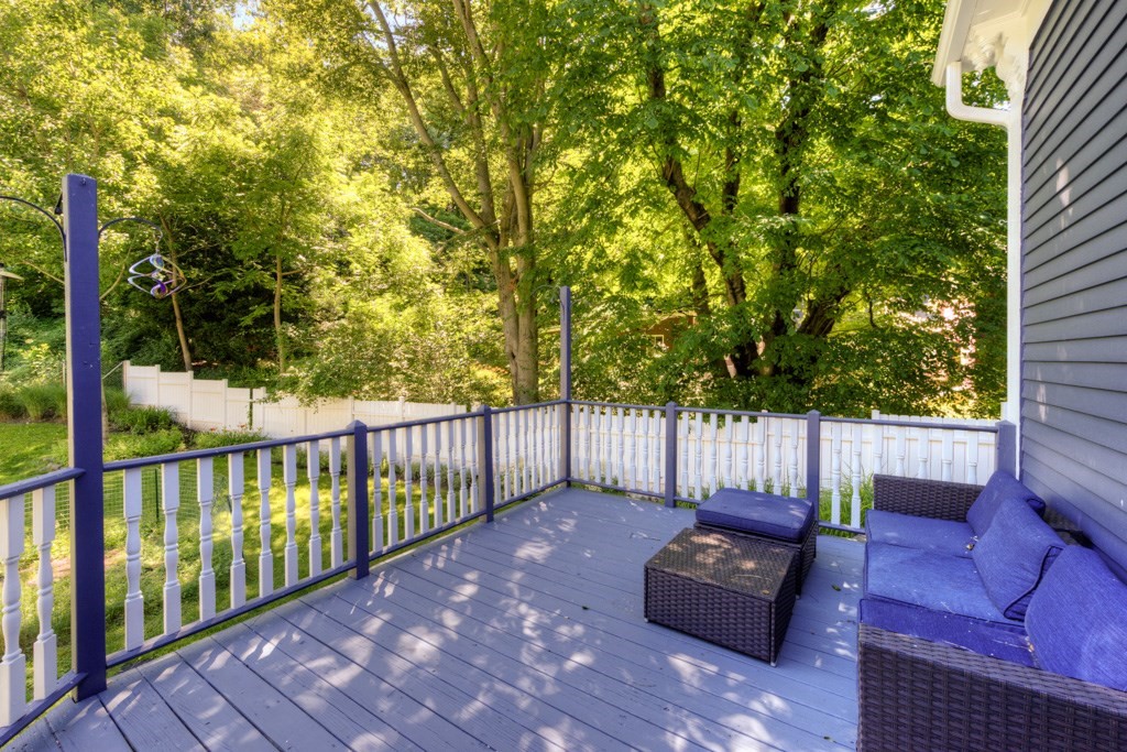 167 Worcester Street Grafton, MA 01536 - Photo 6 of 42 a view of a two chairs in the roof deck