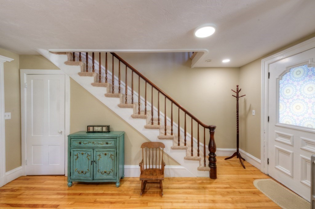 167 Worcester Street Grafton, MA 01536 - Photo 9 of 42 a view of entryway and hall with wooden floor
