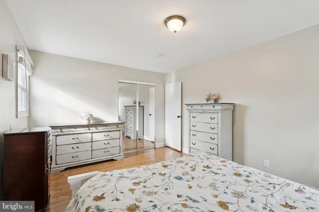 a room with a dresser and a mirror