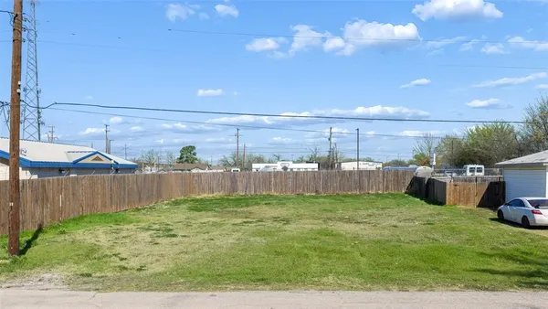 a view of a backyard with a garden