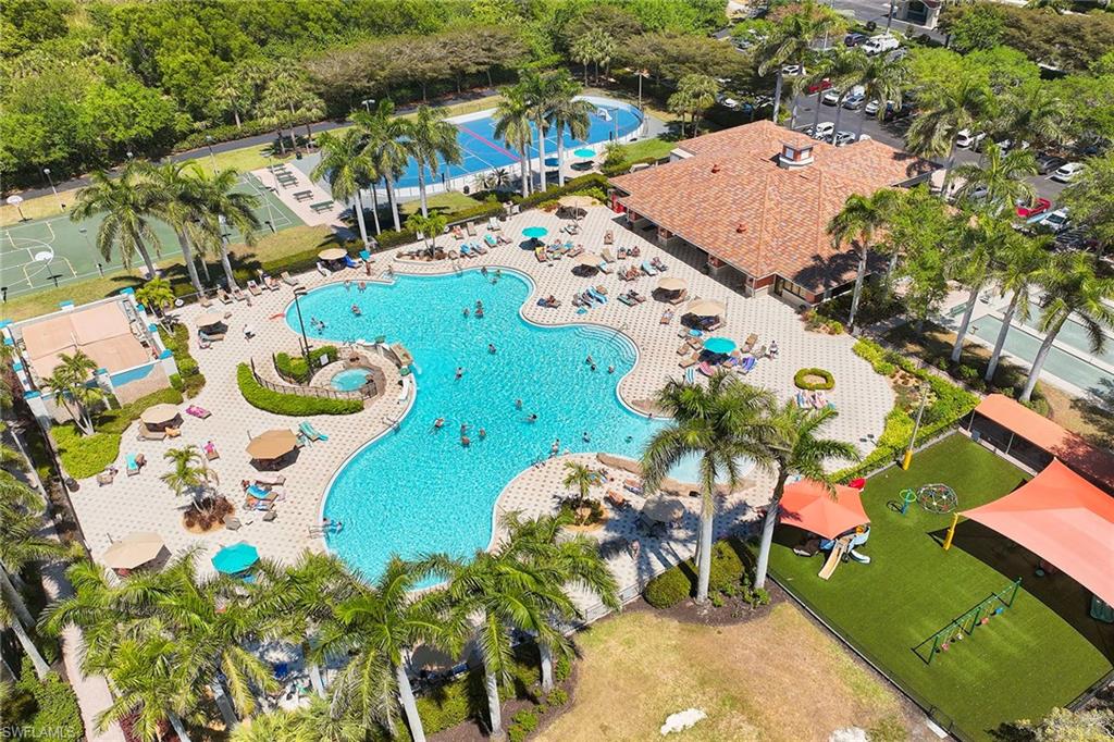 21651 Bella Terra Boulevard Estero, FL 33928 - Photo 36 of 40 an aerial view of a pool patio chairs and fire pit