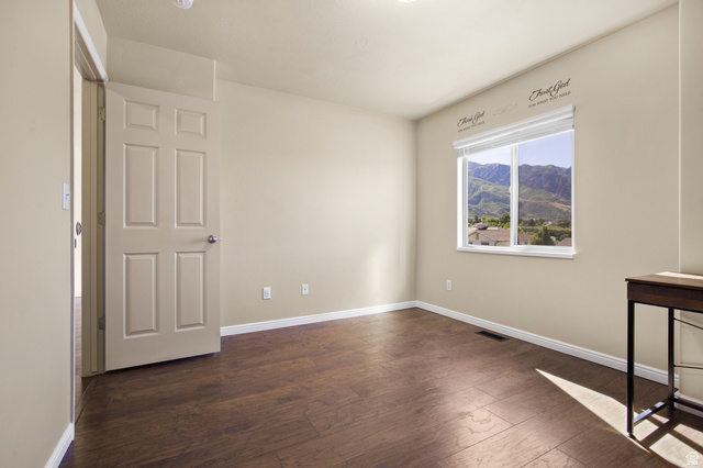 2005 Redtail Way Layton, UT 84040 - Photo 27 of 37 Neutral tone walls with wood-finish flooring