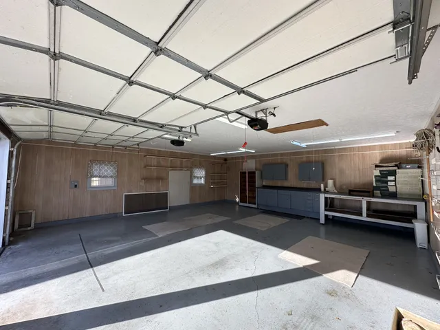 a view of a garage with furniture