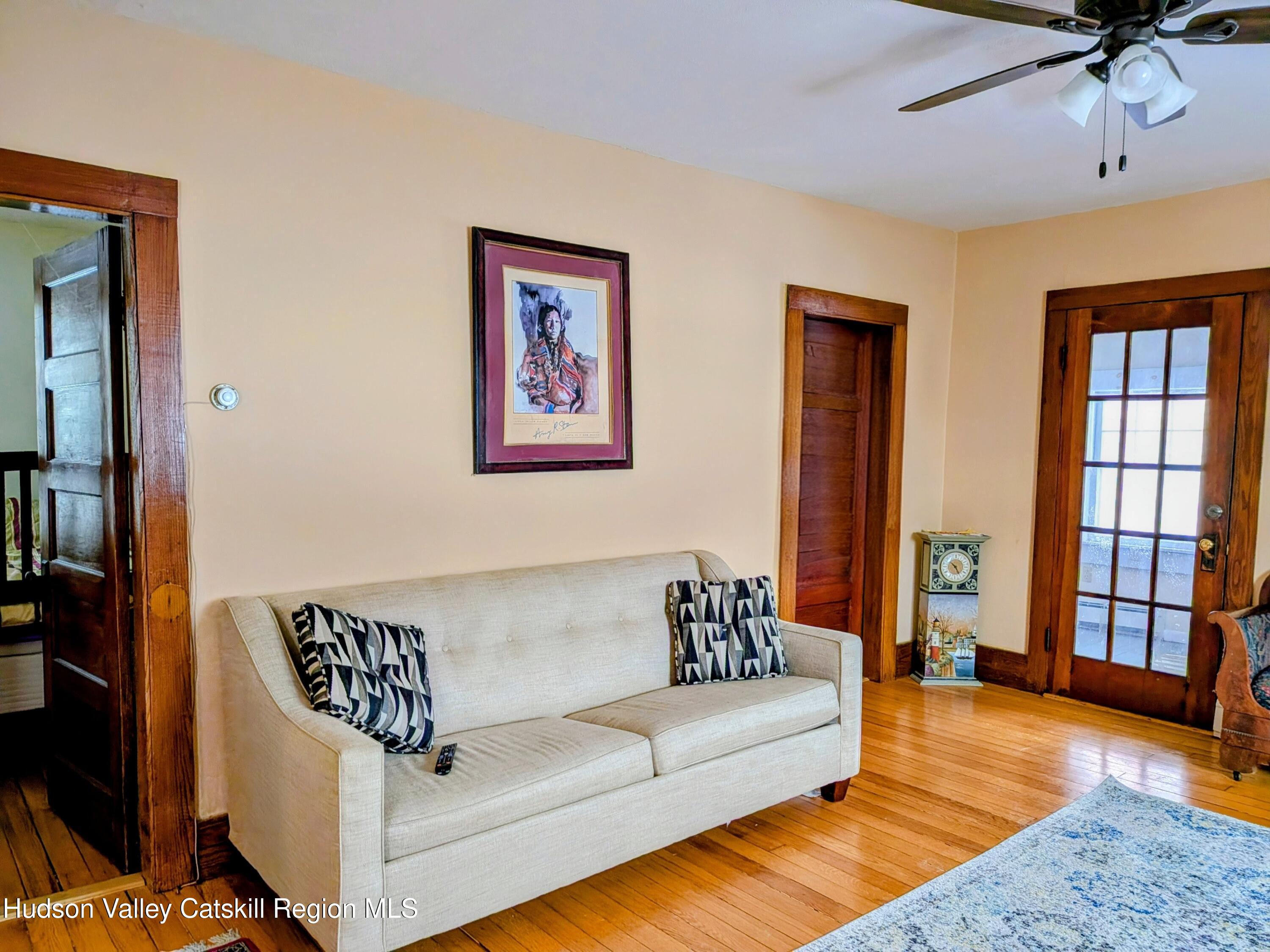 351 Presbyterian Hill Road Stephentown, NY 12168 - Photo 17 of 46 a living room with furniture and a window