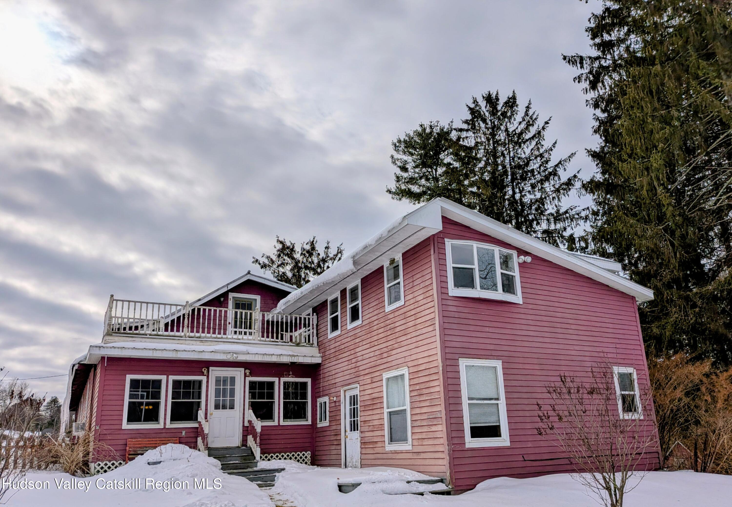 351 Presbyterian Hill Road Stephentown, NY 12168 - Photo 2 of 46 a front view of a house with a yard