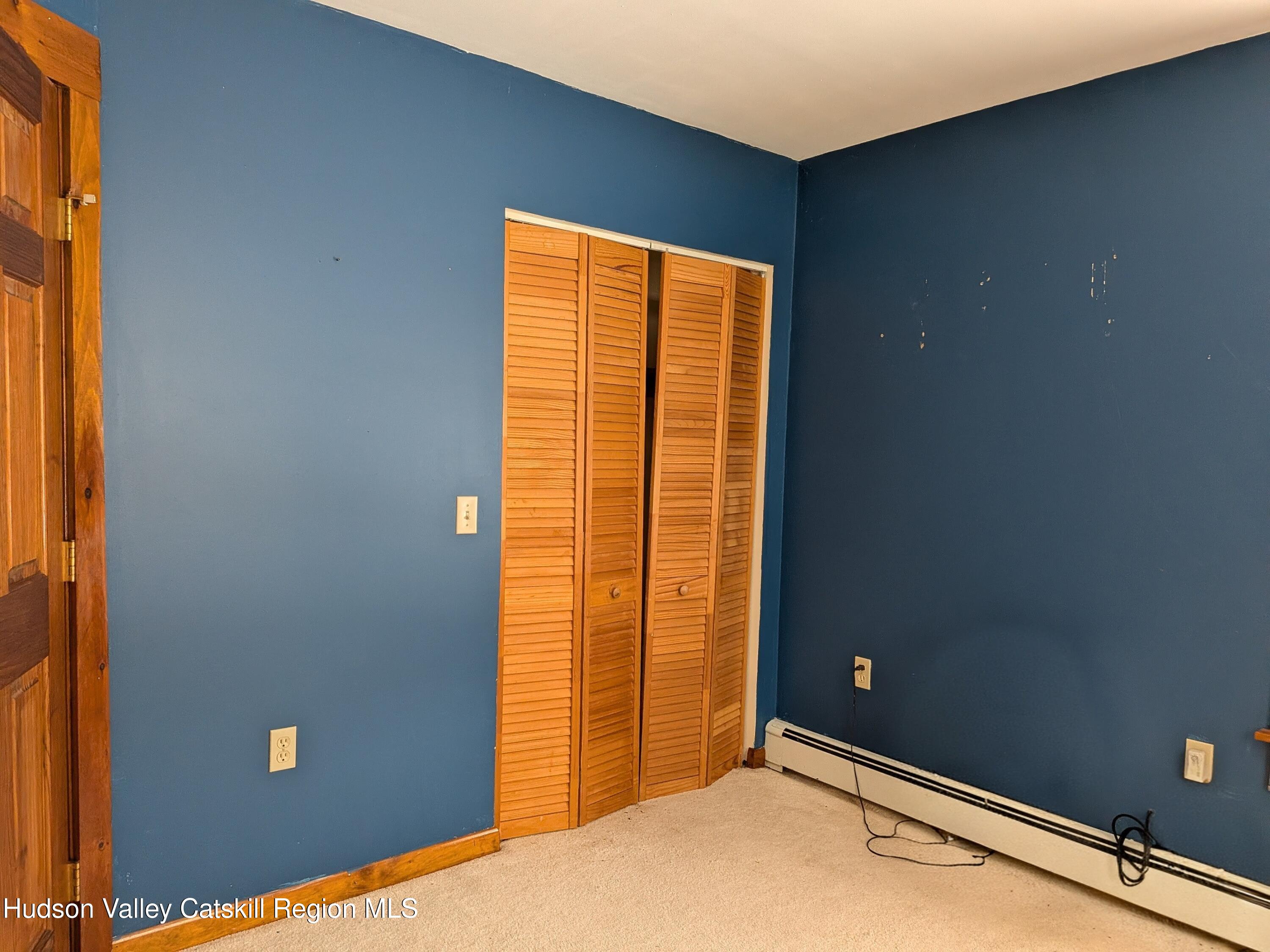 351 Presbyterian Hill Road Stephentown, NY 12168 - Photo 29 of 46 a view of an empty room with a window