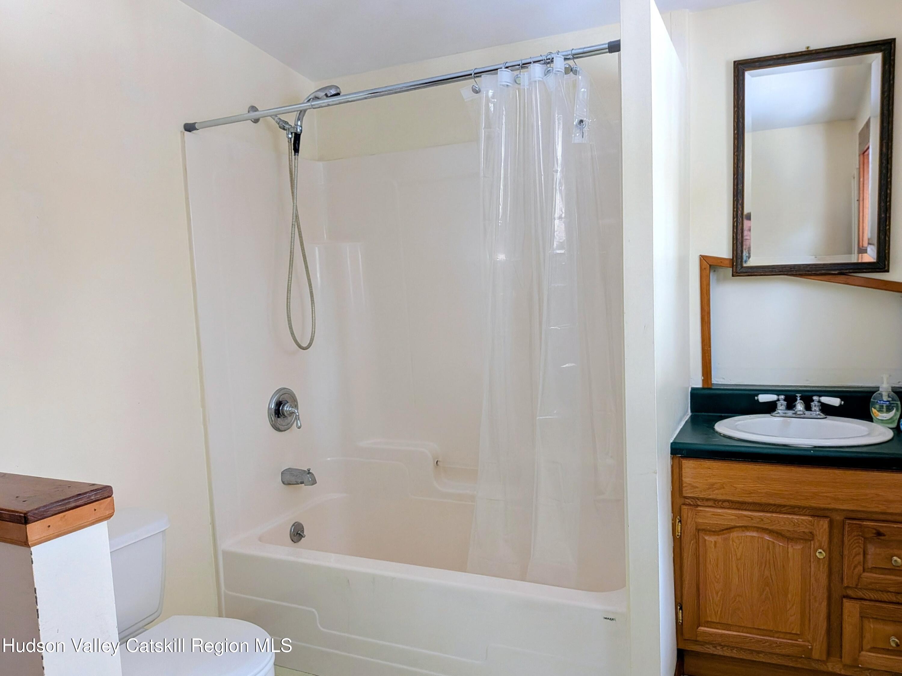 351 Presbyterian Hill Road Stephentown, NY 12168 - Photo 36 of 46 a bathroom with a granite countertop sink toilet and shower