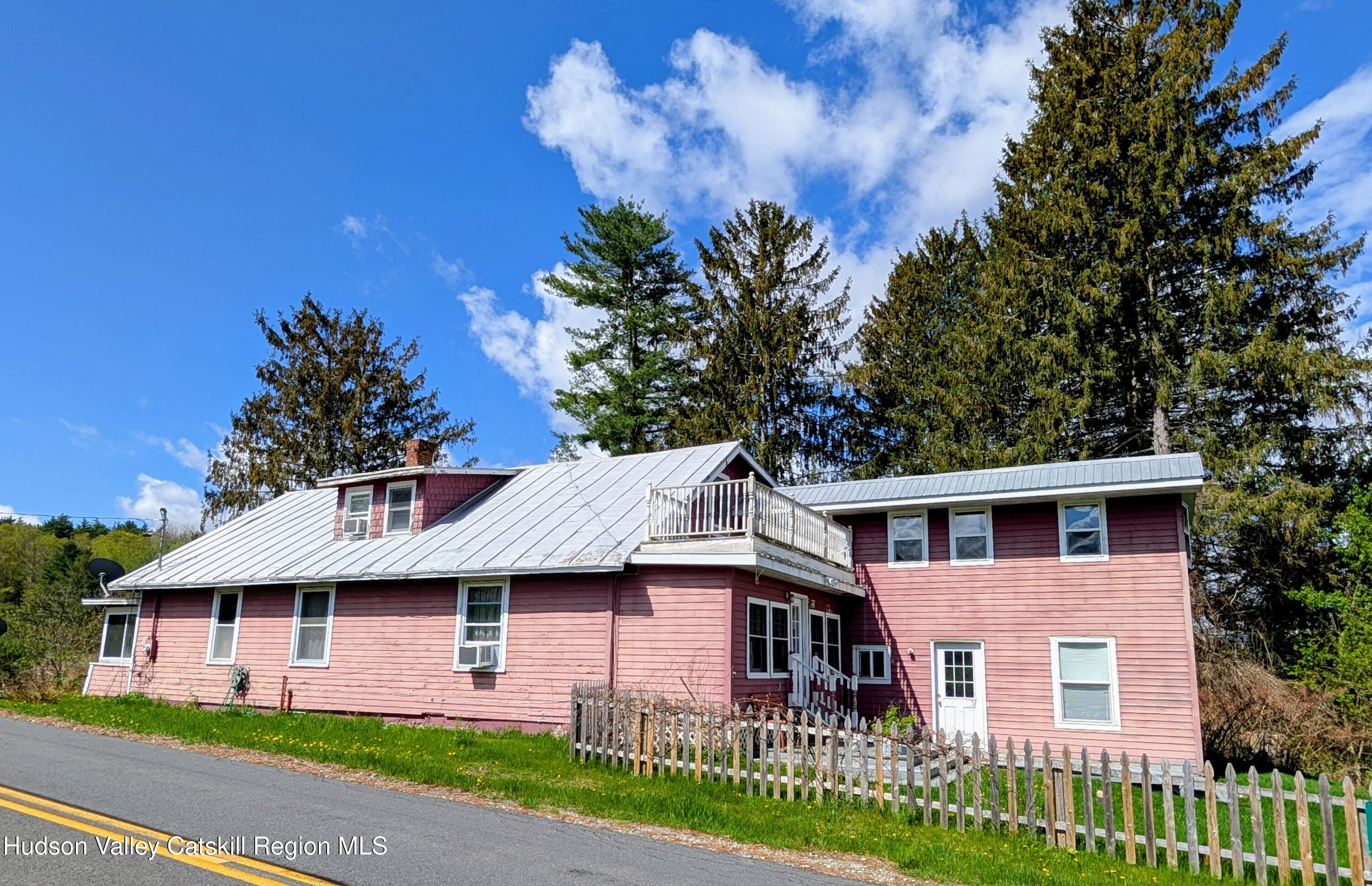 351 Presbyterian Hill Road Stephentown, NY 12168 - Photo 4 of 46 a front view of a house with a garden