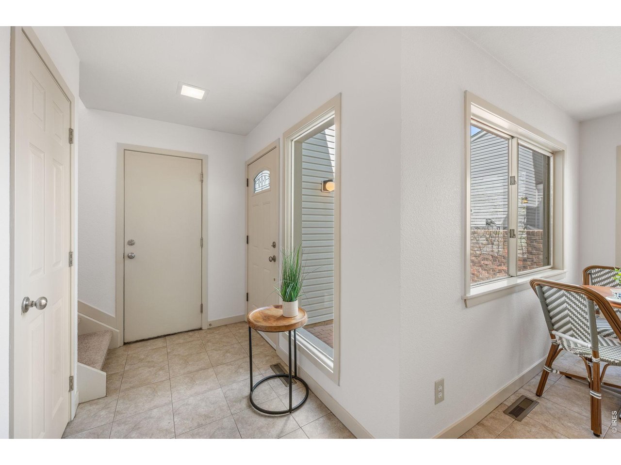 7422 Clubhouse Road Boulder, CO 80301 - Photo 3 of 25 Brand new paint throughout, tile entrance, access to attached garage