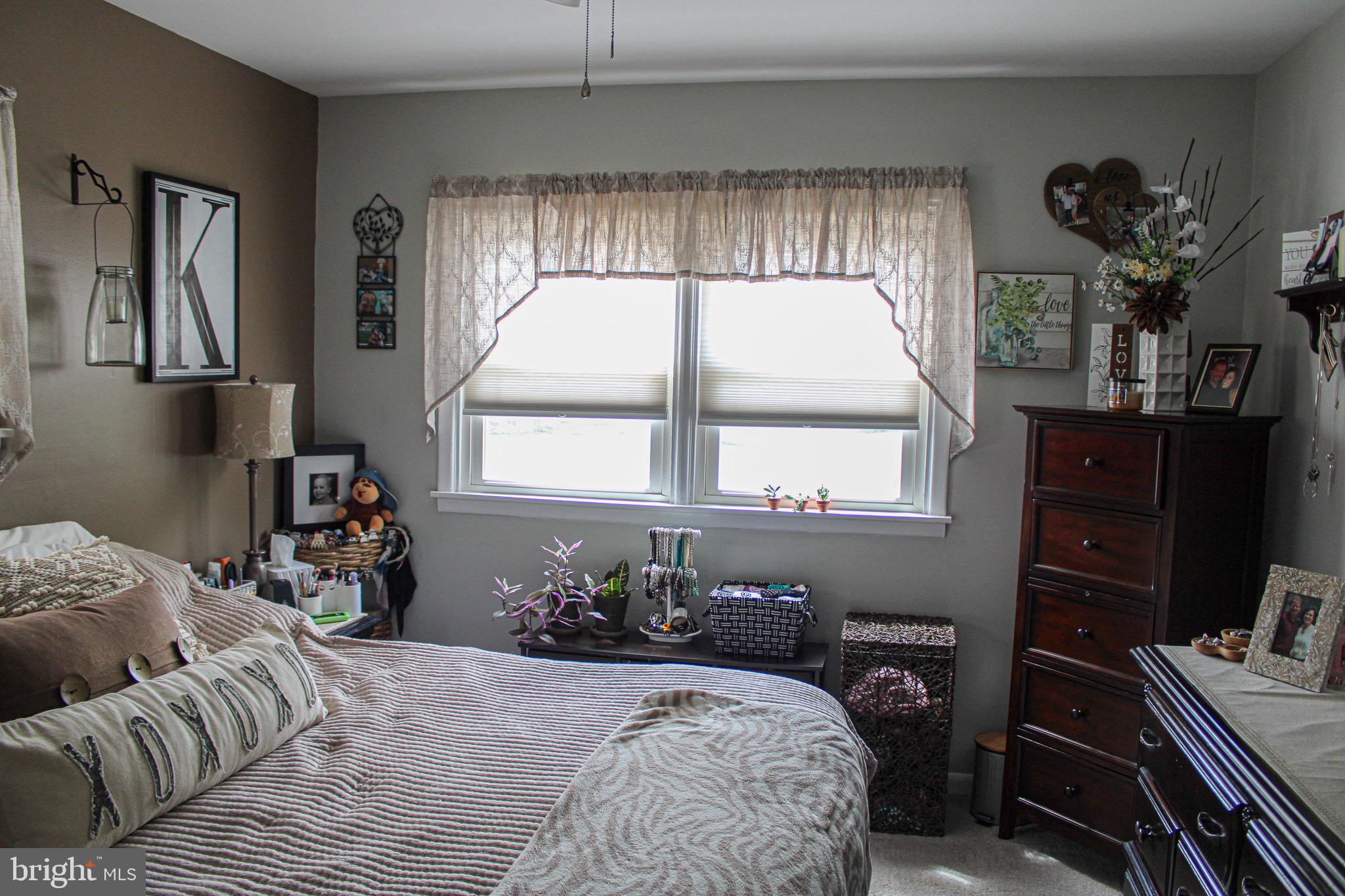 963 Windsor Road Warminster, PA 18974 - Photo 15 of 36 a bedroom with a bed and a window