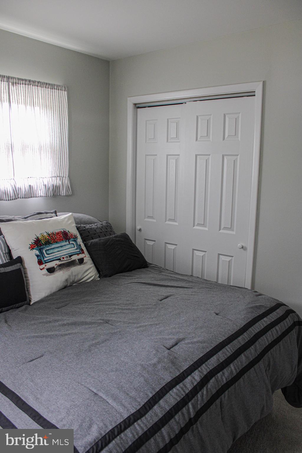 963 Windsor Road Warminster, PA 18974 - Photo 21 of 36 a bedroom with a bed and a window