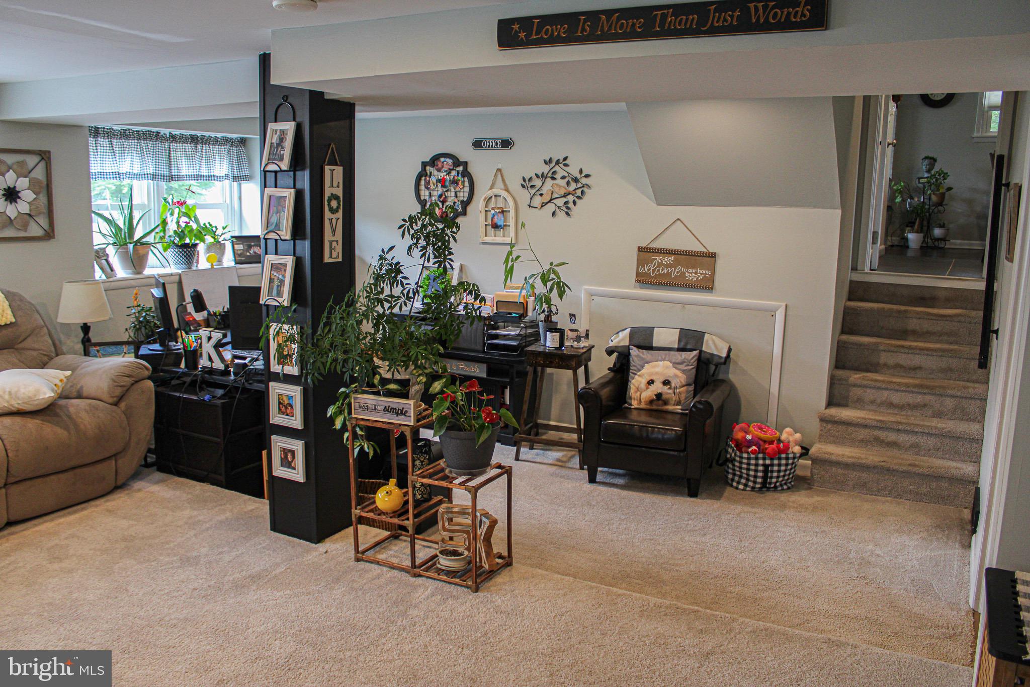 963 Windsor Road Warminster, PA 18974 - Photo 24 of 36 a living room with furniture and a flat screen tv