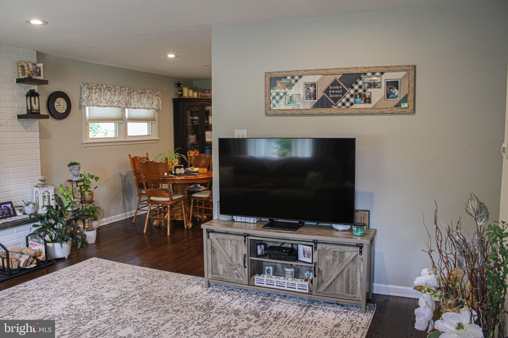 963 Windsor Road Warminster, PA 18974 - Photo 5 of 36 a living room with furniture and a flat screen tv