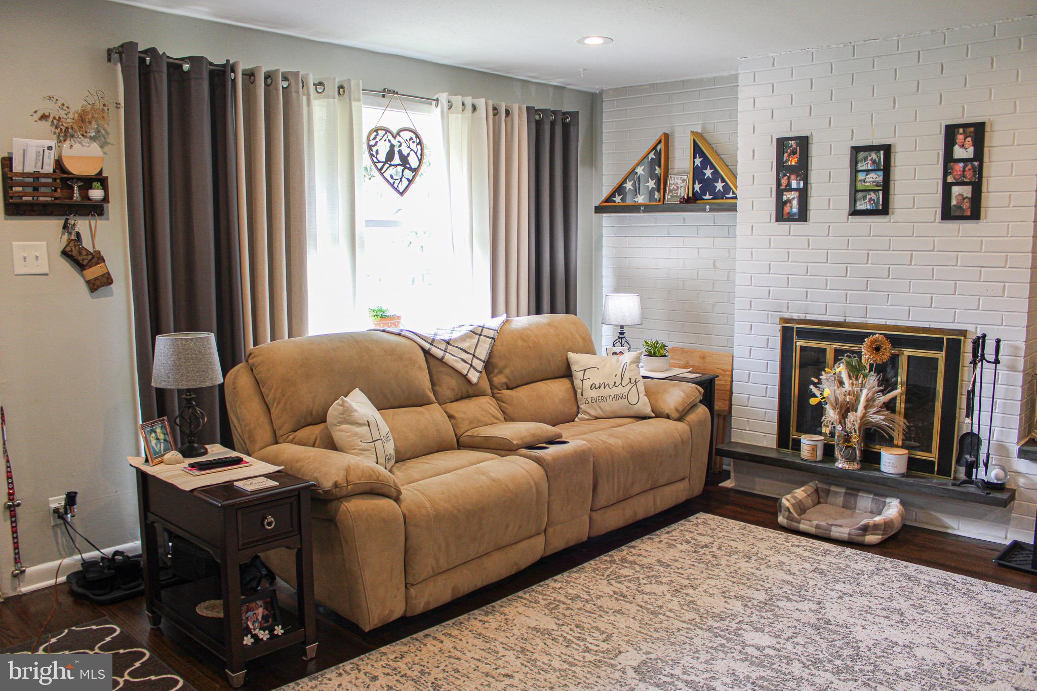963 Windsor Road Warminster, PA 18974 - Photo 6 of 36 a living room with furniture and a fireplace