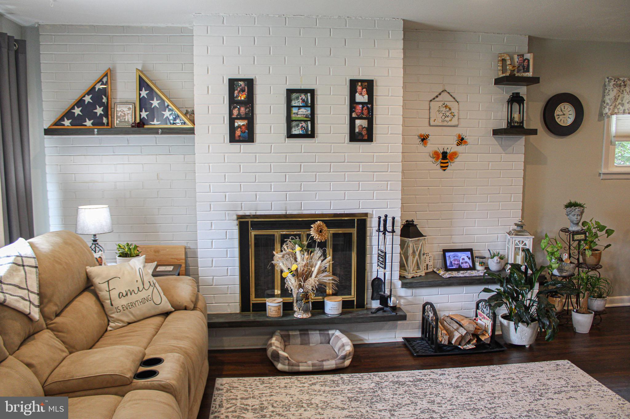 963 Windsor Road Warminster, PA 18974 - Photo 7 of 36 a living room with furniture and a fireplace