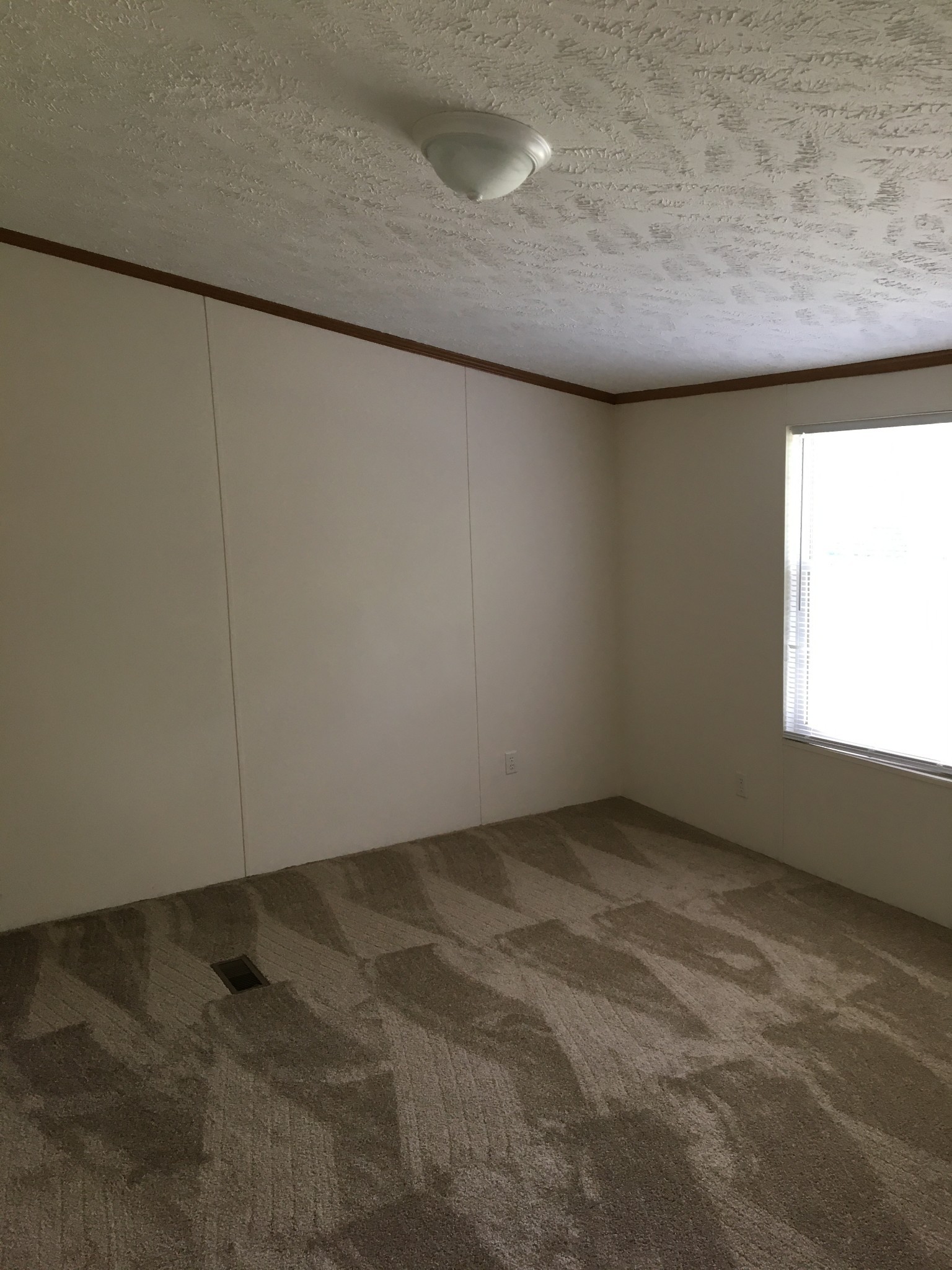 991 Berea Church Road Lebanon, TN 37087 - Photo 9 of 17 an empty room with a window
