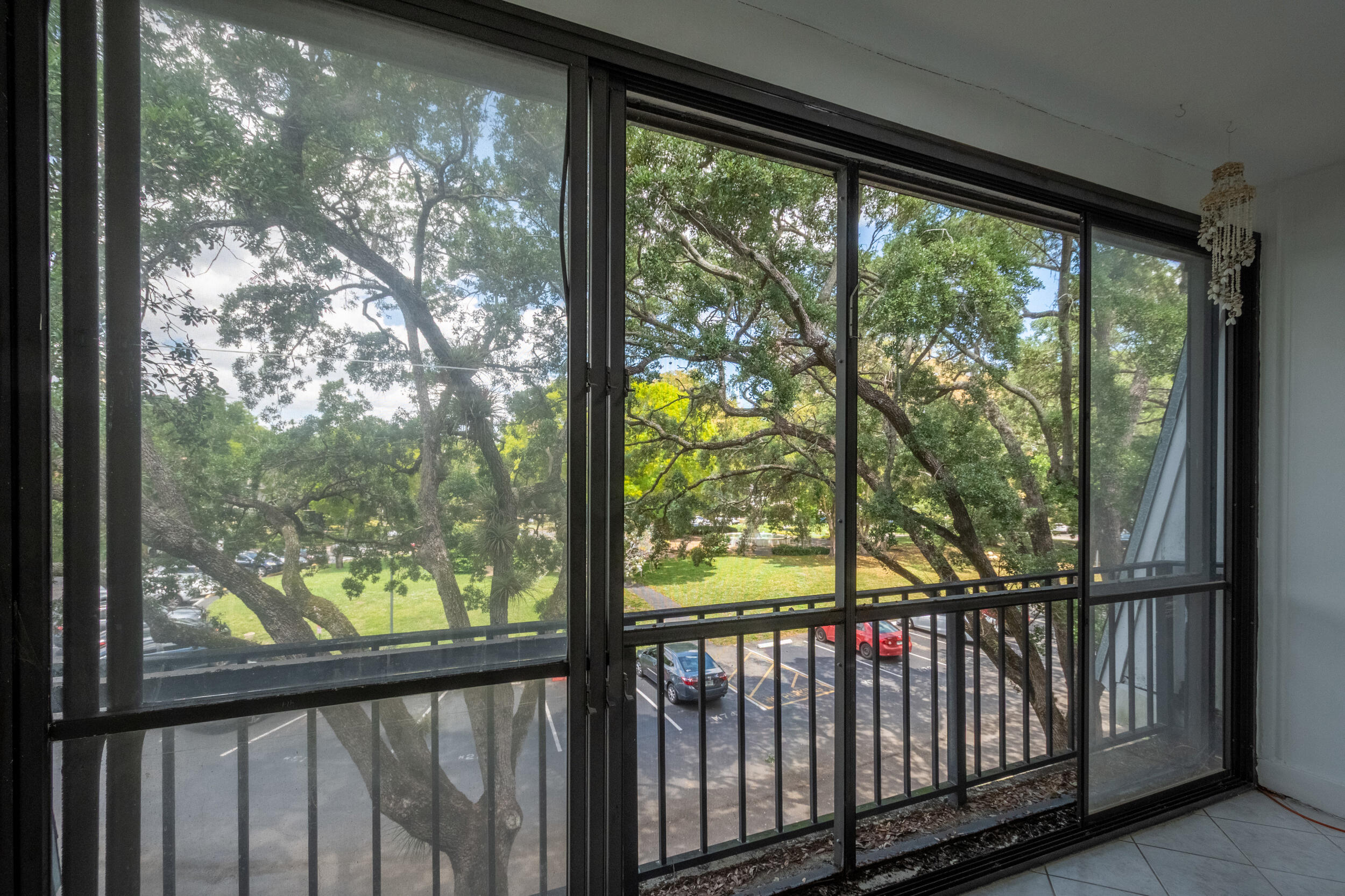 3660 Inverrary Drive, Unit 3Q Lauderhill, FL 33319 - Photo 18 of 35 a view of a wooden deck