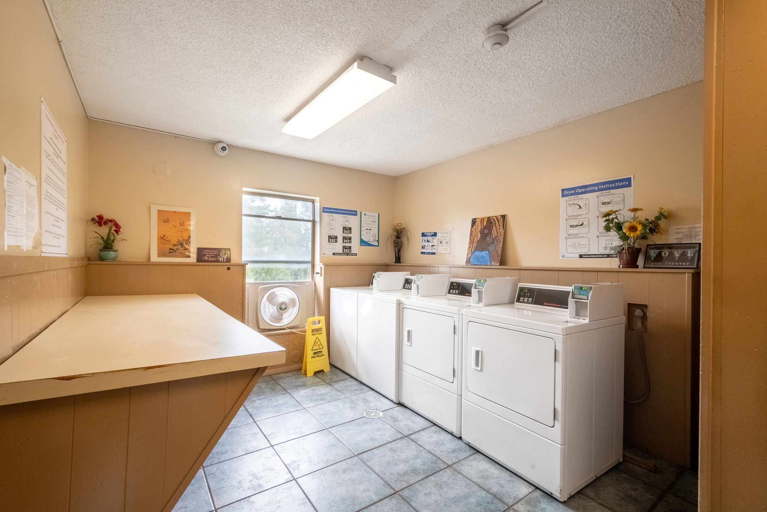 3660 Inverrary Drive, Unit 3Q Lauderhill, FL 33319 - Photo 24 of 35 a room with storage and utility