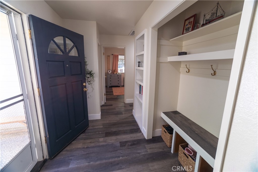 1 San Ramon Drive Chico, CA 95973 - Photo 15 of 42 a view of a hallway with wooden floor and staircase