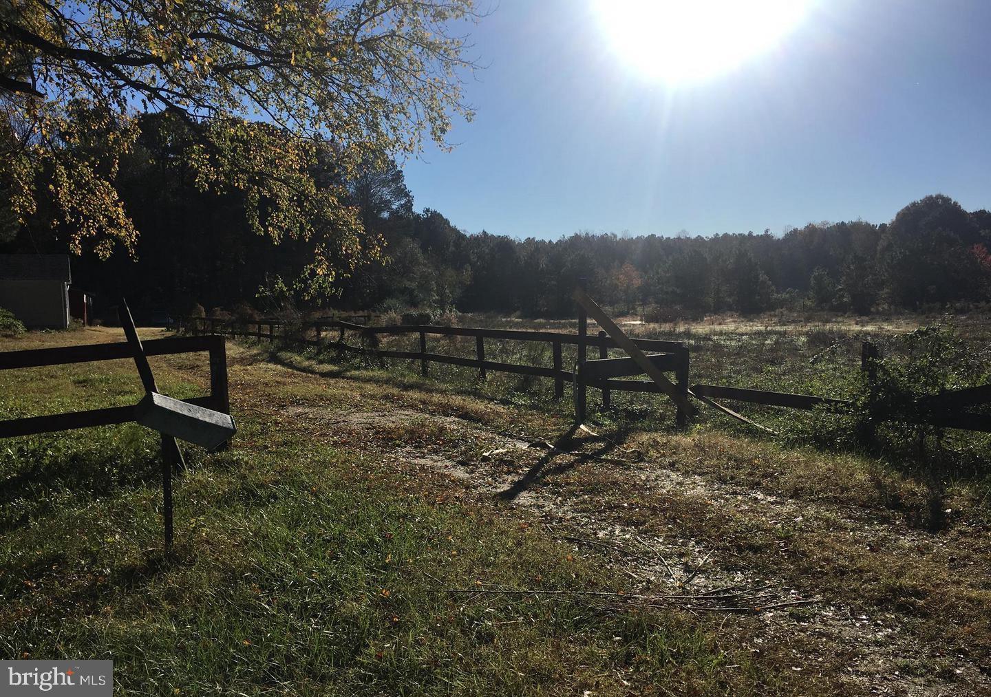 Stable Lane Delmar, MD 21875 - Photo 7 of 11 a view of a bench in a backyard