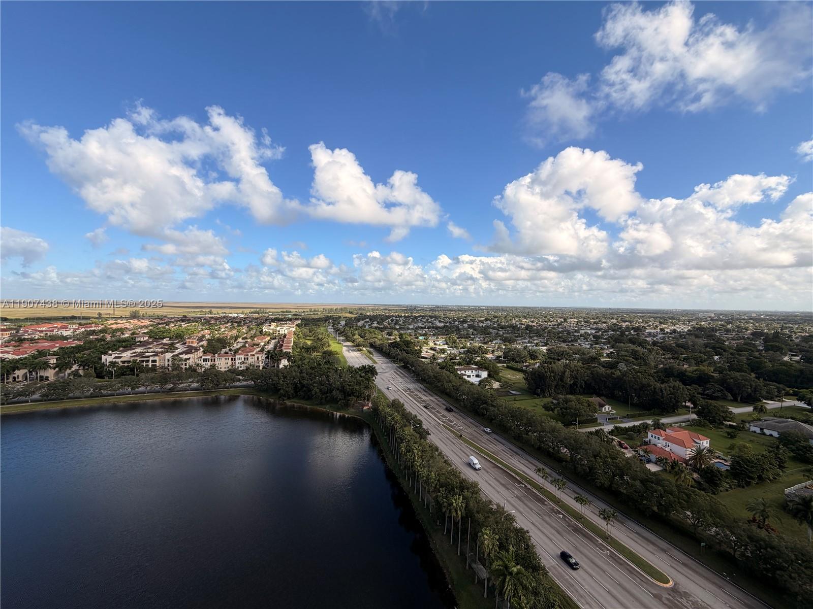 2641 North Flamingo Road, Unit 2208N Sunrise, FL 33323 - Photo 20 of 56 a view of city and a lake